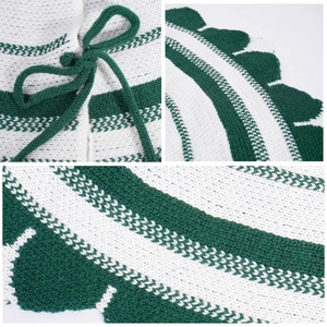 28-inch green and white striped knitted Christmas tree skirt with scalloped edges and tie