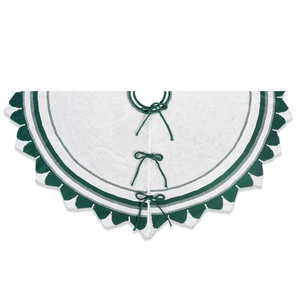 28-inch white knitted Christmas tree skirt with green wavy trim and bow tie closures