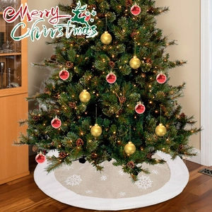 Detail of rustic brown Christmas tree skirt with plush white edge and snowflake patterns