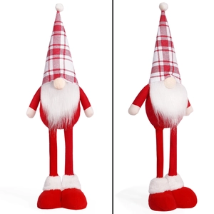 Detail of Christmas gnome plush with plaid hat and long legs on a white background
