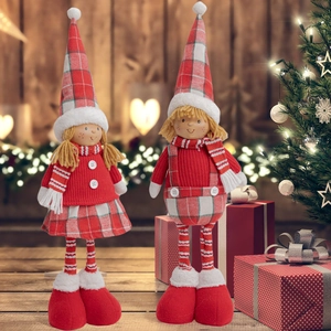 Cute boy and girl Christmas elf dolls with red knit hats and striped socks for home decor