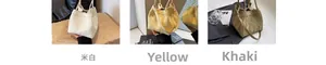 Niche bucket bags in beige, yellow, and khaki with textured leather and slim straps