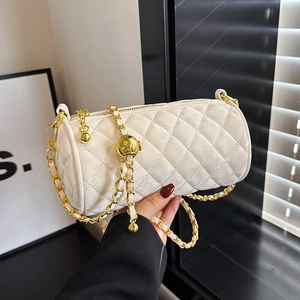White quilted cylinder bag with gold chain strap and adjustable ball bead detailing