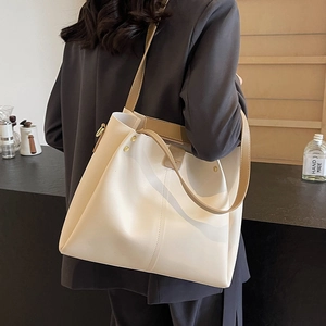 Large beige tote bag with khaki straps for women, perfect for daily commuting and school