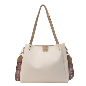 Cream large capacity tote bag with wide ethnic style strap and gold rivet details