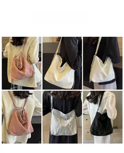Collage of chic pleated tote bags in pink, white, silver, and black on models