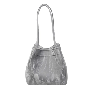 Silver metallic pleated bucket bag with dual handles and minimalist design for women