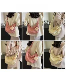 Detailed views of pink and beige crossbody dumpling bags with plush star charms