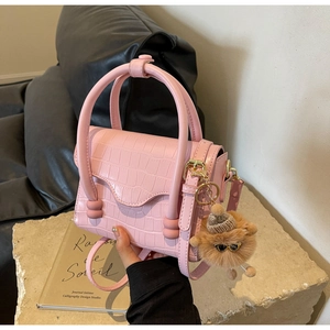 Pink croc-embossed small square bag with cute sunglasses teddy bear charm and handle