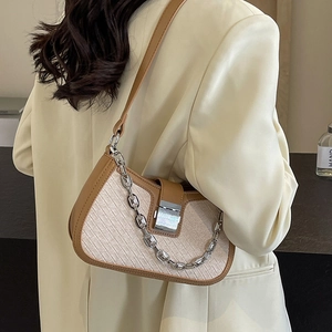 Vintage beige underarm bag with brown leather trim and silver chain for women