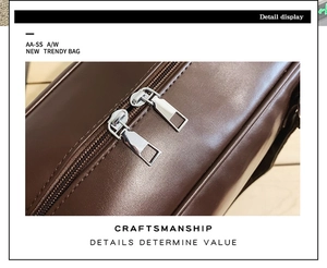 Detail view of smooth dark brown leather tote with premium dual silver metal zippers