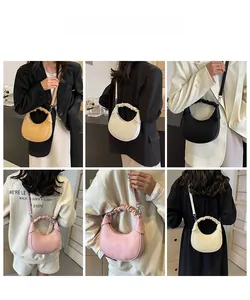Detail view of crescent crossbody bags with scrunchie handles in four versatile colors