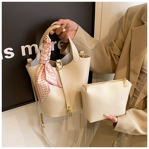 Chic cream litchi grain leather bucket bag set with pink silk scarf and gold padlock
