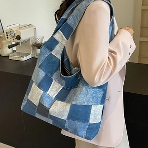 Patchwork denim tote bag for women featuring a large capacity and retro casual styling
