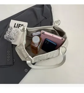 Top view showing the large interior capacity of this ivory butterfly tote bag