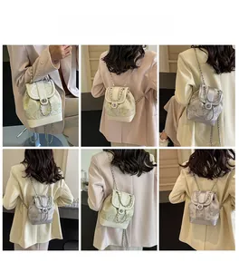 Detailed views of the floral butterfly chain backpack showing various carrying styles