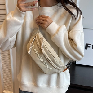 Minimalist beige crossbody chest bag with embroidery and woven zipper for women