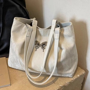 White large-capacity butterfly tote bag with marble texture and silver butterfly emblem