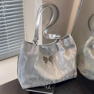 Silver Y2K butterfly tote bag with metallic pleated texture and large capacity