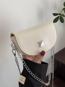 Cream white saddle bag with silver metal chain and square buckle for minimalist fashion