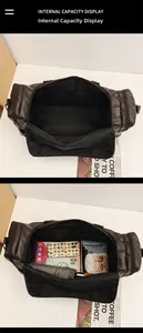 Detail of dark brown leather travel bag showing spacious interior with zipper pocket