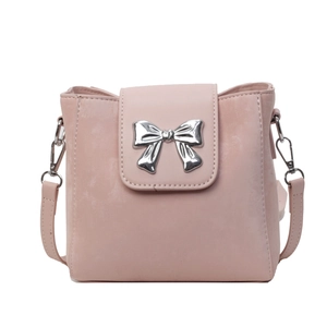 Chic pink bucket bag for women featuring a silver metal bow accent and slim shoulder strap