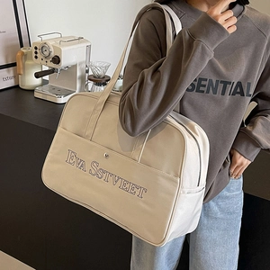 Große beige Reisetasche aus Segeltuch mit Doppelgriffen und Fronttasche für Reisen