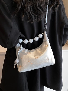 Silver Boston bag with floral embroidery and marble bead chain strap for women