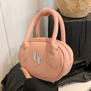 Chic pale pink oval leather handbag with silver geometric logo and thick round handle