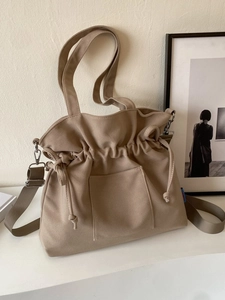 Sac fourre-tout en toile kaki avec cordon de serrage et bandoulière réglable