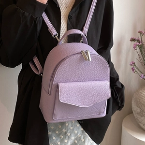 Chic purple pebbled leather ballet style mini backpack with stylish silver chain zipper