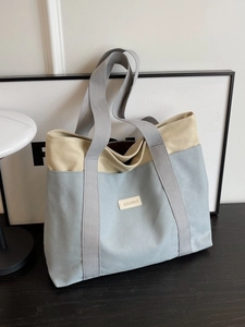 Minimalist large capacity canvas tote bag with color block design and gray handles