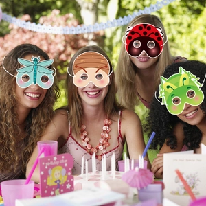 Kids wearing colorful insect paper masks like dragonfly and ladybug at an outdoor party