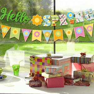 Hello Spring banner with green glitter and floral flags for party decorations