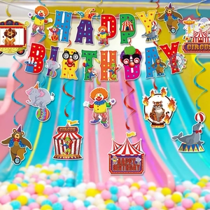 Circus themed Happy Birthday banner and swirl decorations with cartoon animal pendants