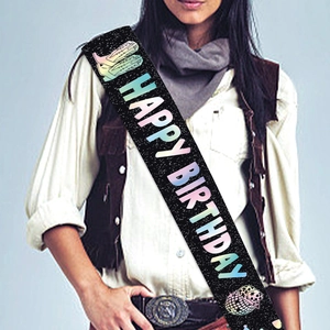 Cowboy themed birthday sash with disco ball and boots on black fabric background