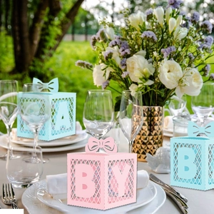 Baby shower candy boxes with letter hollow design and bow tie top in pink and blue