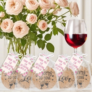Personalized cork coaster favors set with organza bags and floral thank you gift tags
