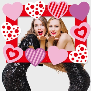 Valentine party photo booth frame with colorful hearts for wedding photography