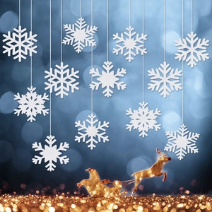 White snowflake ornaments set with golden Santa sleigh silhouette on festive bokeh background