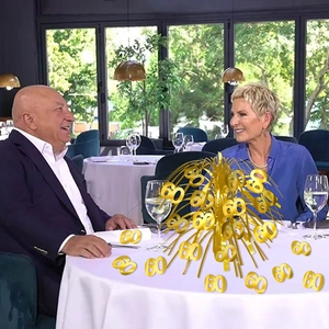 Golden 60th birthday table centerpiece decoration with metallic spray for party events