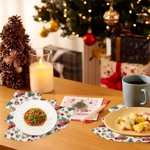 Christmas table placemats with festive red truck and tree prints for holiday dining