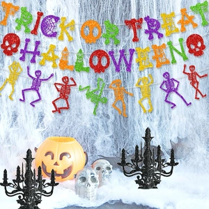 Glittery Halloween Trick or Treat banner set with dancing skeletons for party decor