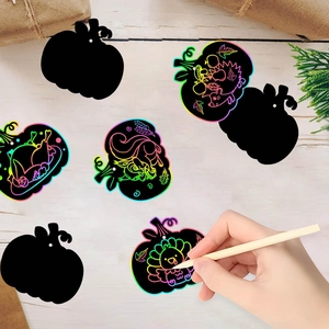 DIY pumpkin scratch art tags with rainbow colors and wood stylus for autumn party decor