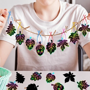 Rainbow scratch art ornaments set featuring autumn leaves and acorns for festive decoration