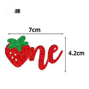 Detailed dimensions of glitter strawberry 'one' cake topper at 7cm by 4.2cm for 1st birthday