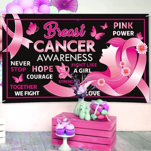 Breast Cancer Awareness backdrop with pink ribbons and floral elements for party decor