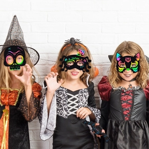 DIY Halloween scratch art masks featuring rainbow skulls, spiders, and cats for kids' party