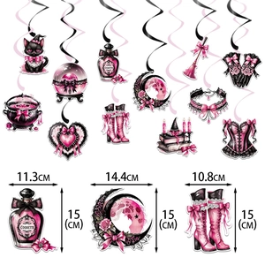 Detail of pink and black Coquette Halloween party swirl decorations with size measurements