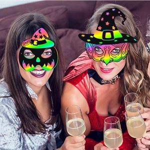 DIY Halloween scratch art paper masks with colorful rainbow pumpkin and witch designs